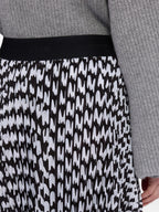 Black Pleated Soleil Skirt With All-Over Logo Print