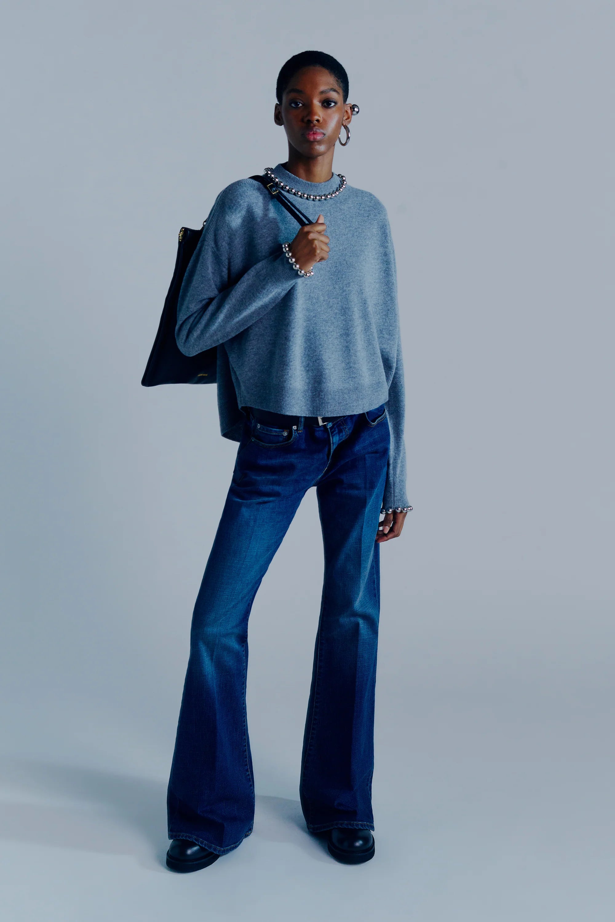 Knitwear With Embroidered Appliques
