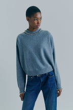 Knitwear With Embroidered Appliques