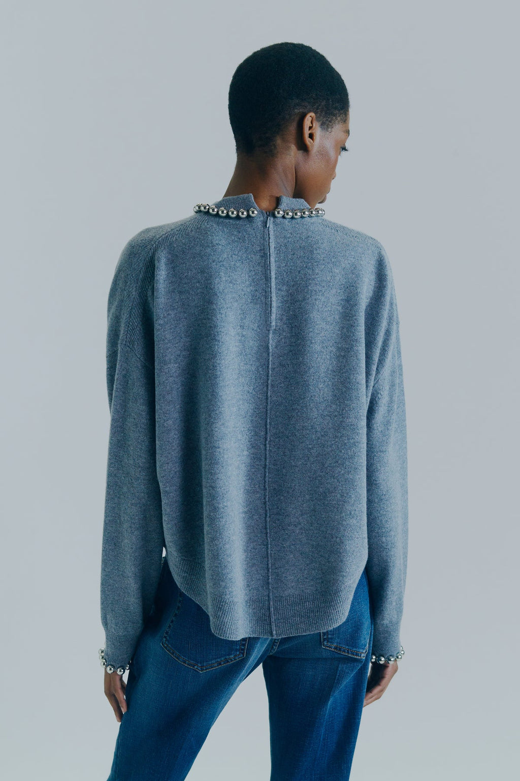 Knitwear With Embroidered Appliques